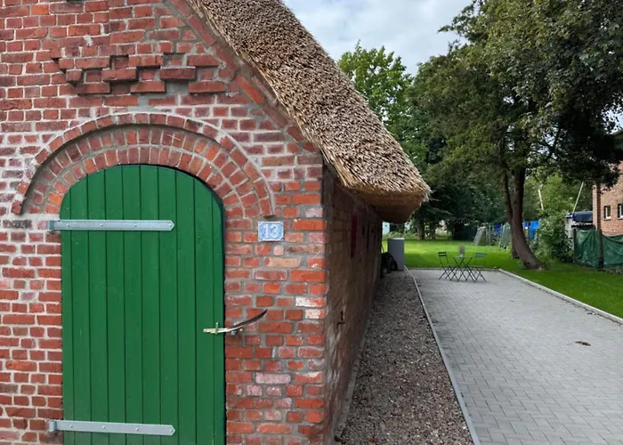 Oolt Huus No 1 I Exklusives Wohnen Im Denkmalgeschuetzten Reetdachhaus Appartement